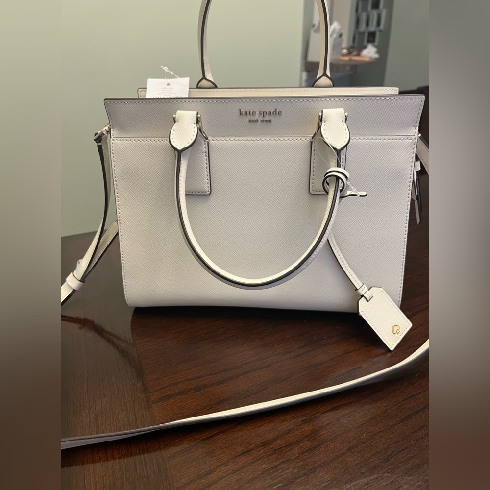 Kate Spade Madison Saffiano Leather Medium Satchel
COLOR:
Meringue 
NWT